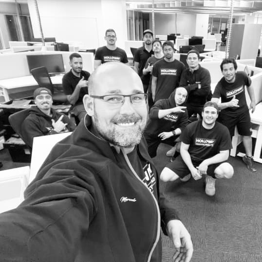 Holloway team packing up a workstations at a commerical office