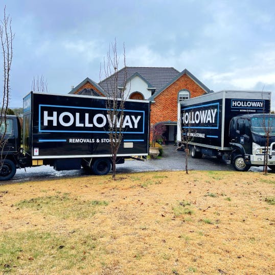 Holloway truck in front of the house