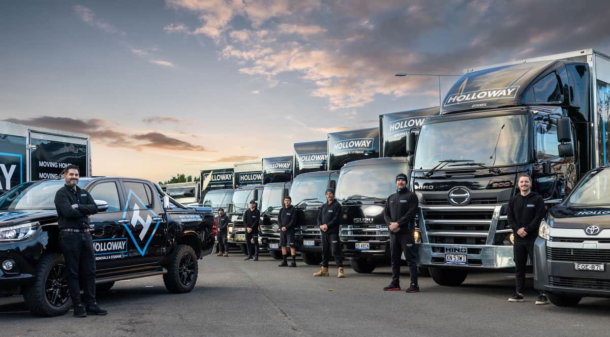 Holloway team with trucks and vehicles