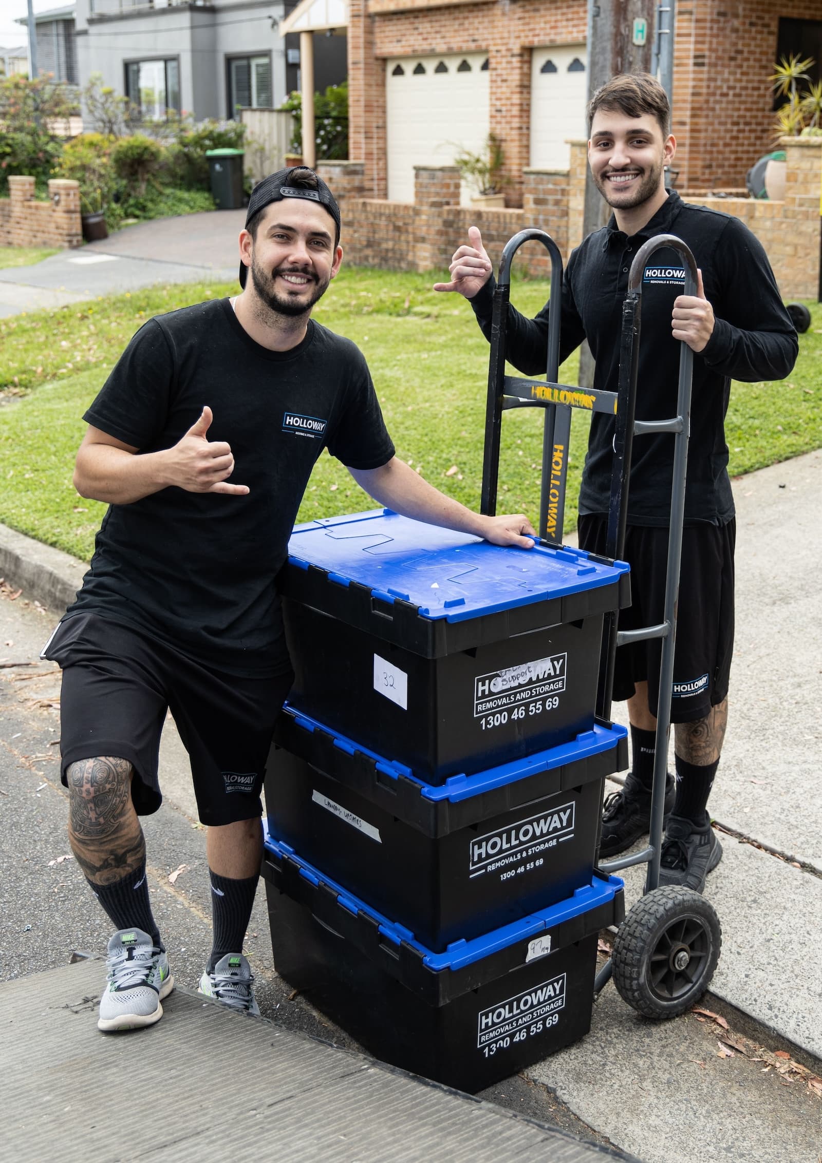 Removalists moving storage crates
