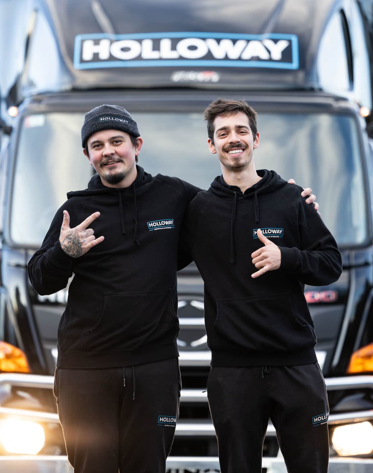 Holloway removals team in-front of a truck