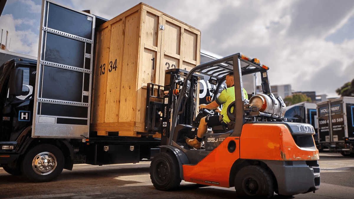 forklift loading module storage into a truck