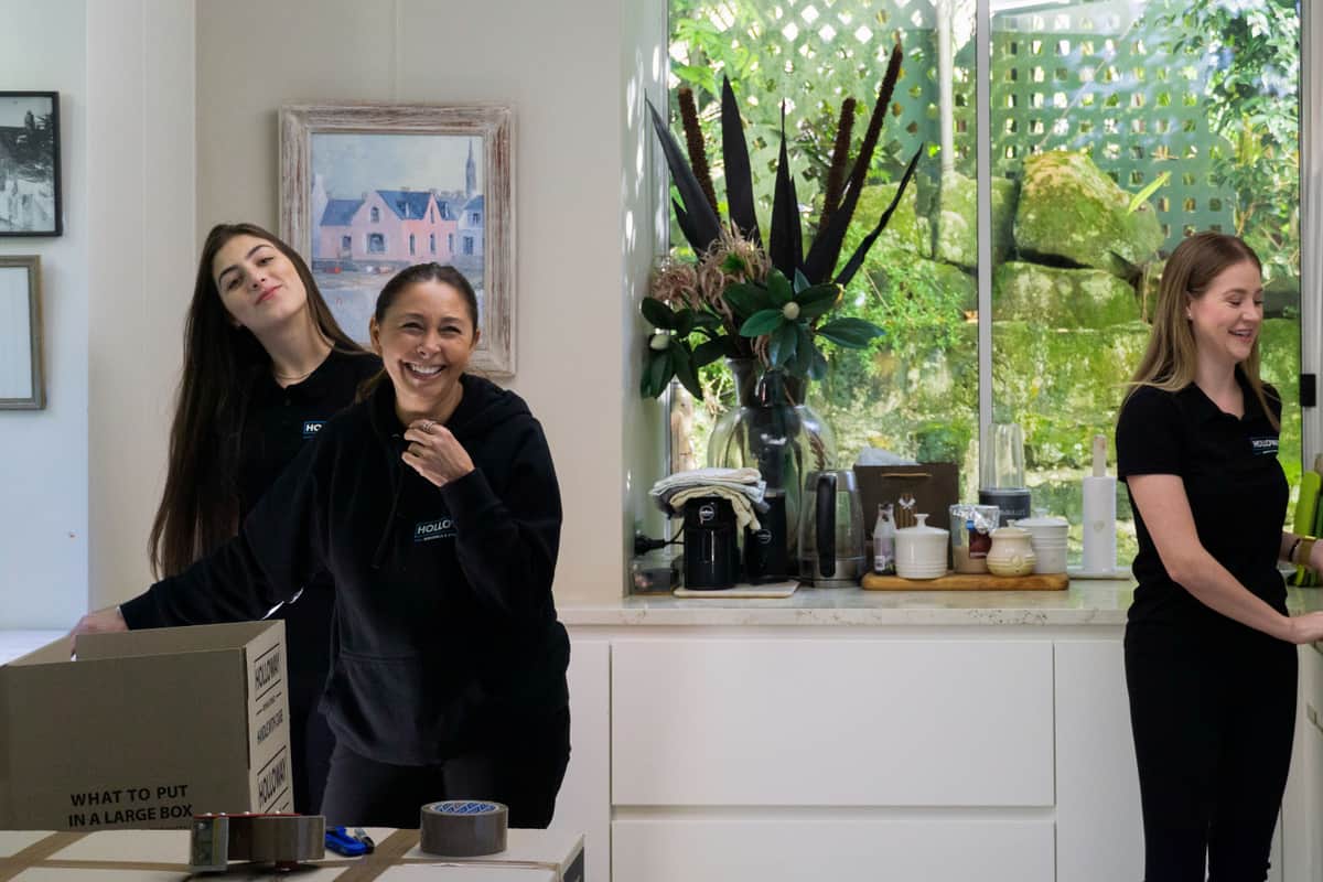 three ladies packing a house move