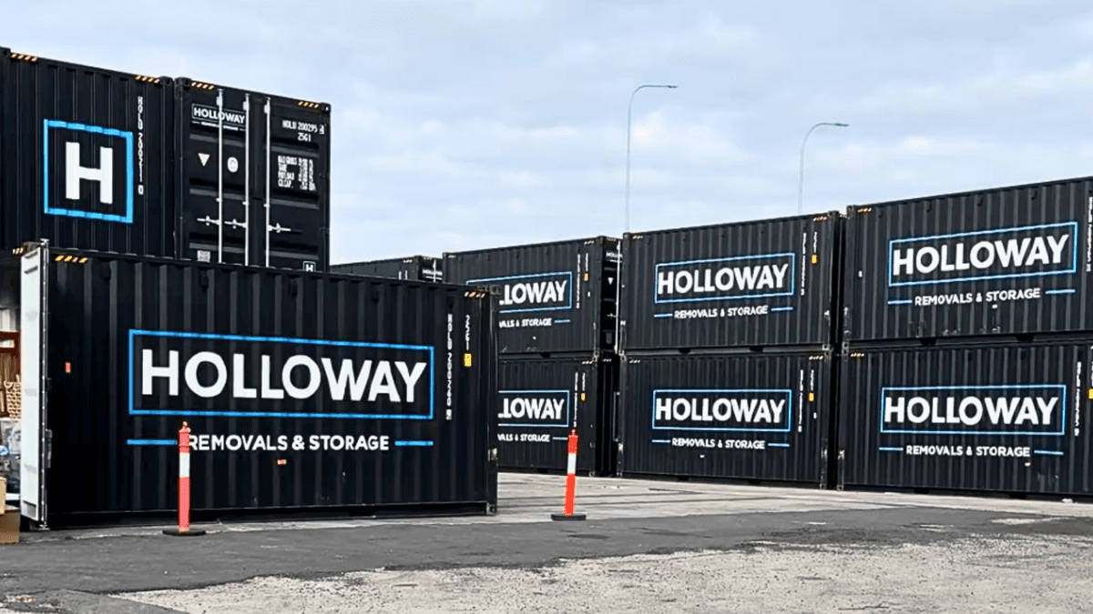Holloway Removals & Storage shipping containers in a St Peters storage yard.