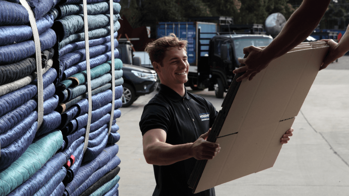 removalist with moving blankets and boxes for Melbourne move