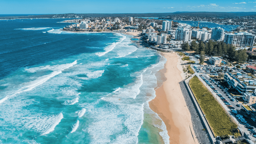Aerial panoramic view of Cronulla Beach in Sydney, Australia with seaside apartments.