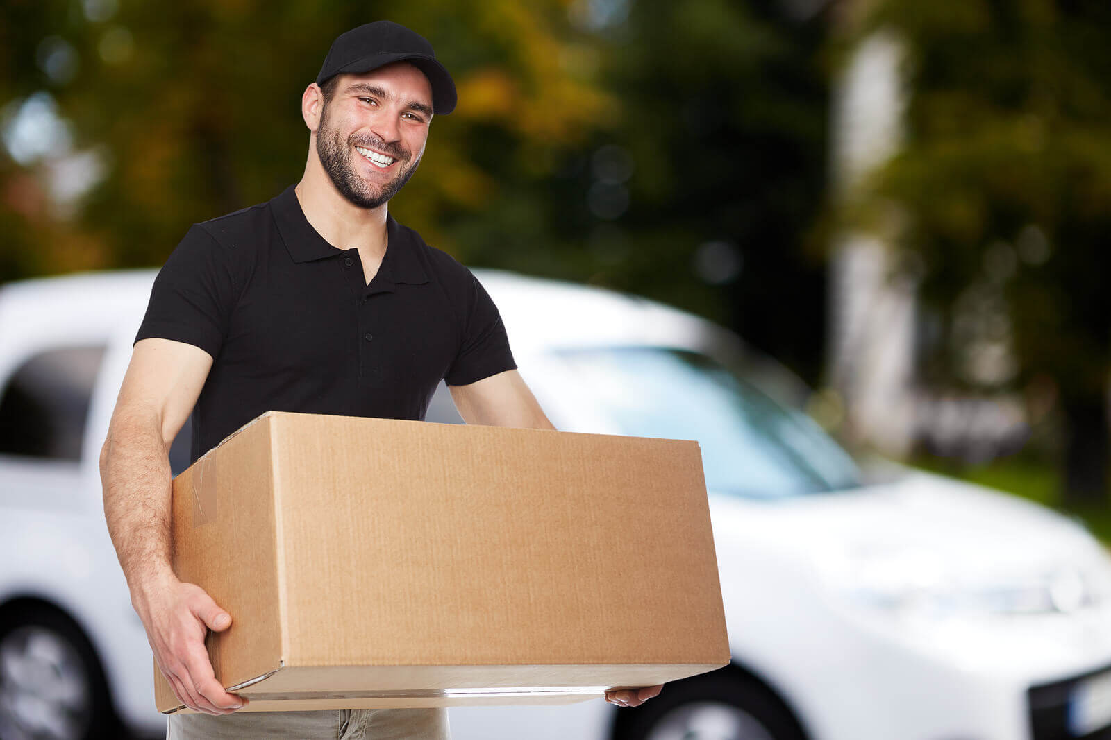 bigstock Smiling Delivery Man 72723652