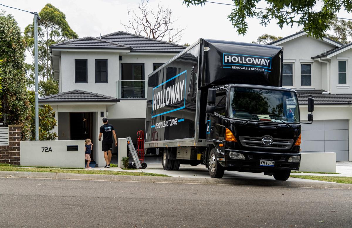 moving truck outside a home, moving with kids